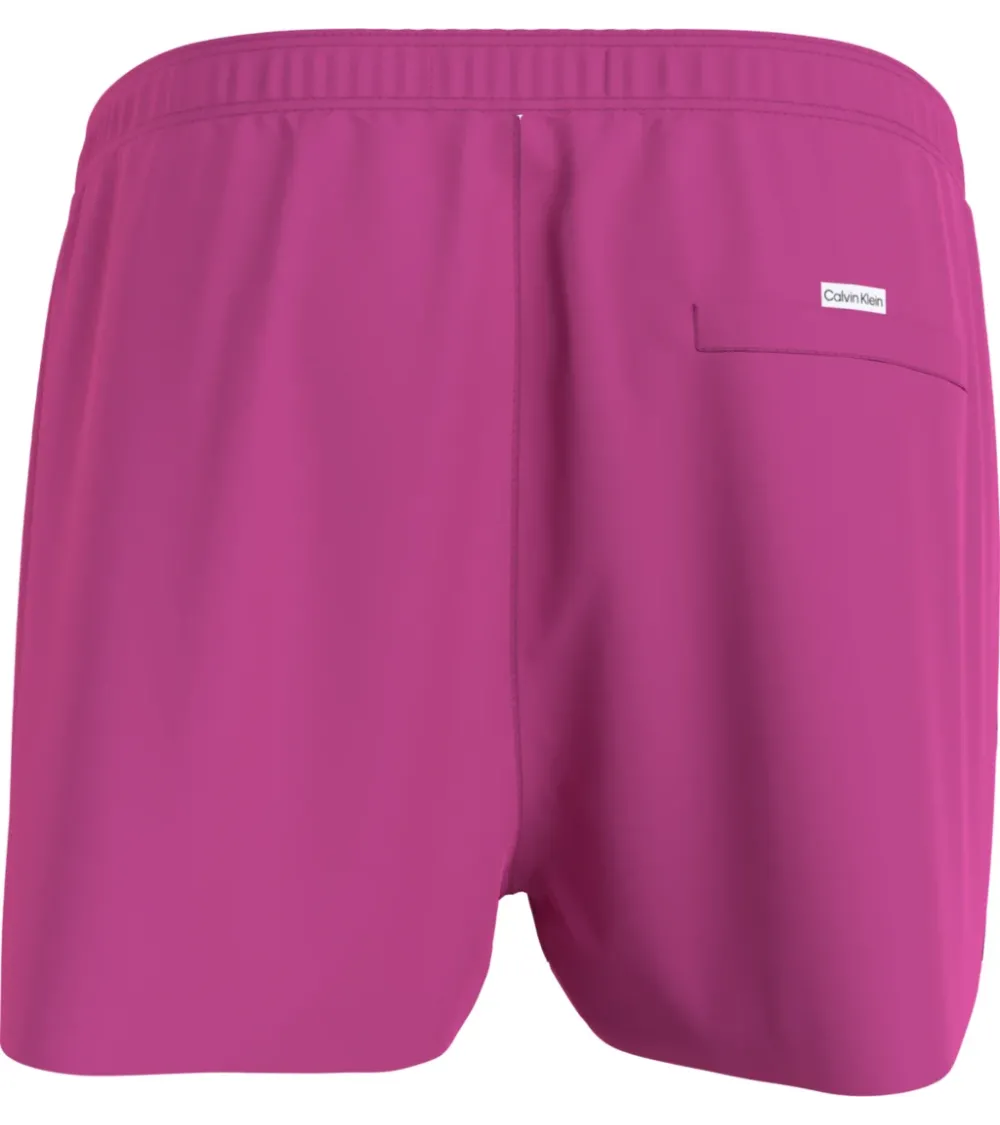 Calvin Klein swim trunks with logo