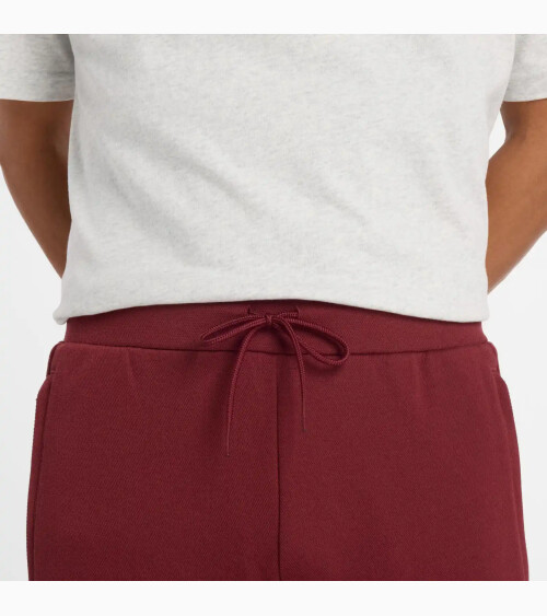 New Balance pantaloni Post Season Pique Track Pant
