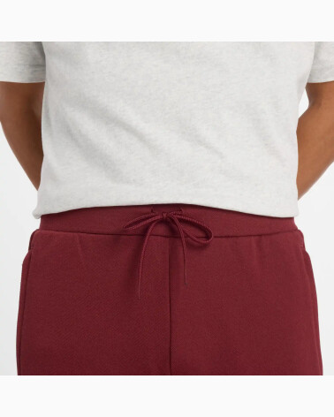 New Balance pantaloni Post Season Pique Track Pant